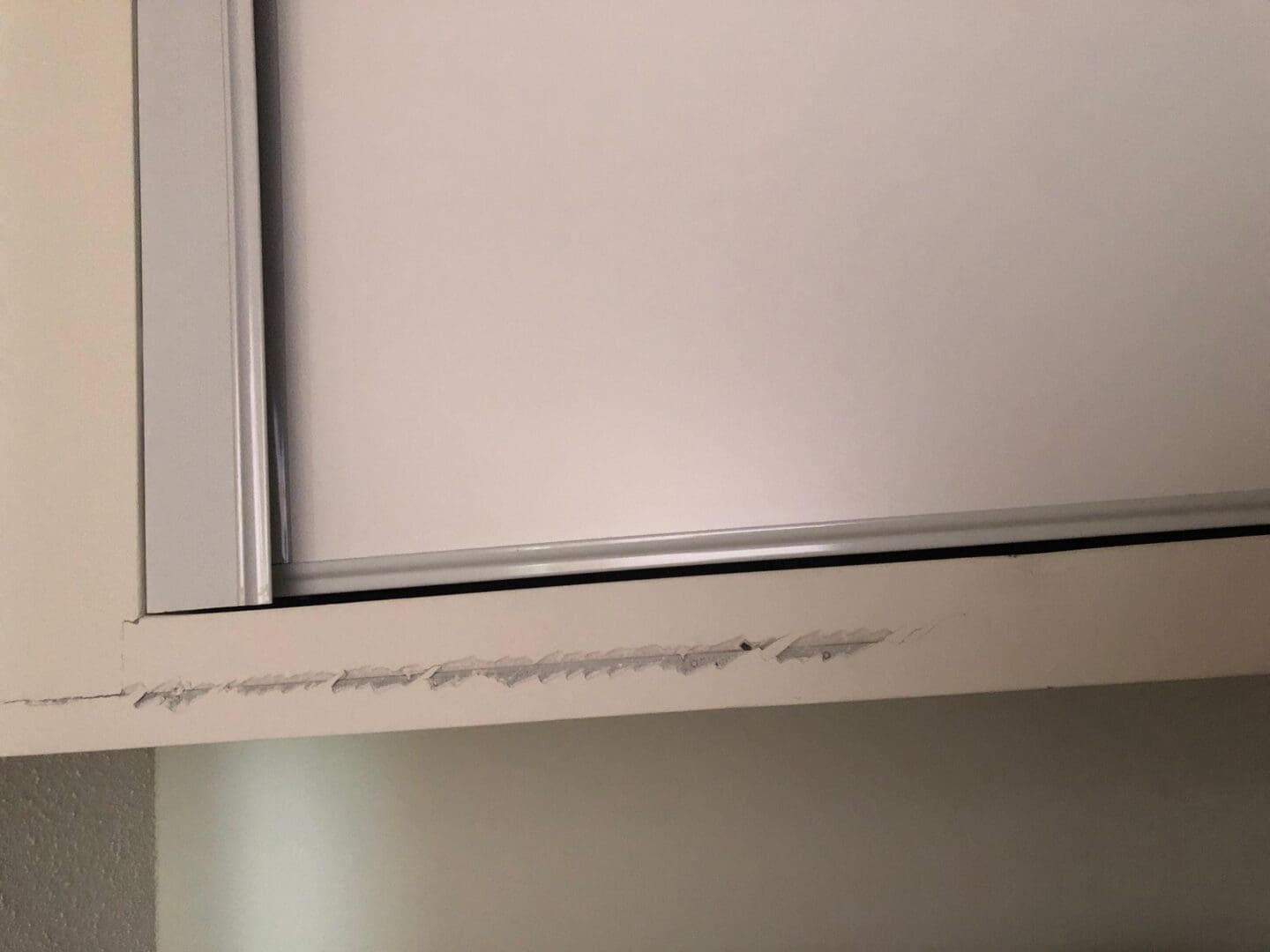 A white door with some writing on it