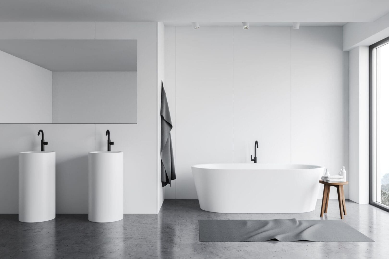 A bathroom with two sinks and a tub.