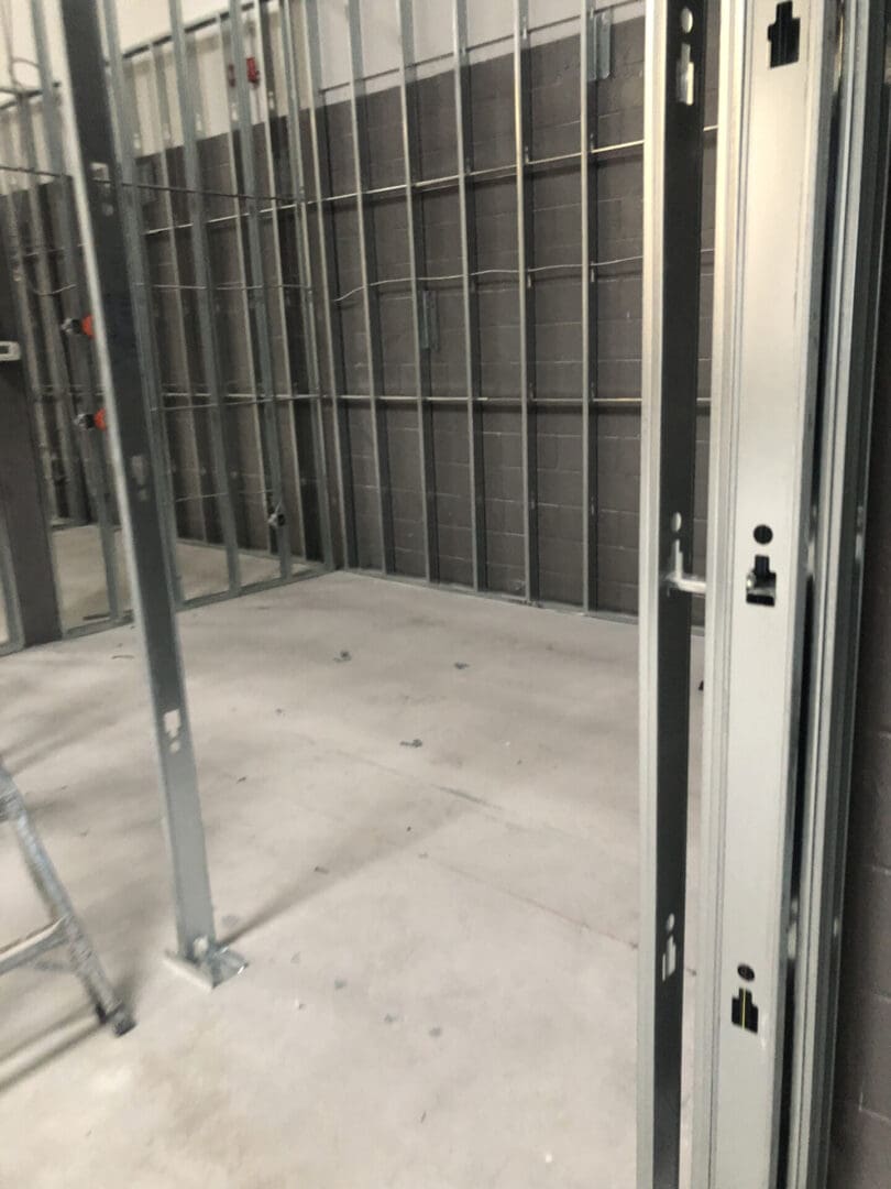 A room with metal bars and walls in it