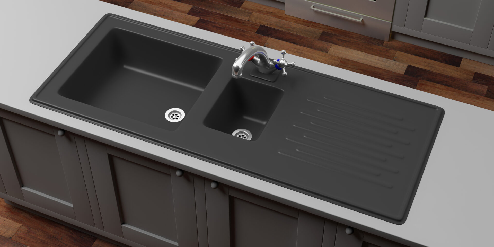 A black sink sitting on top of a wooden counter.