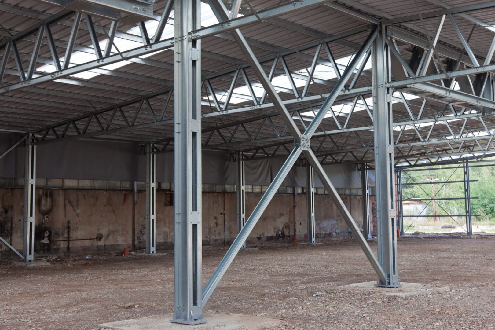 A large metal structure in an empty building.