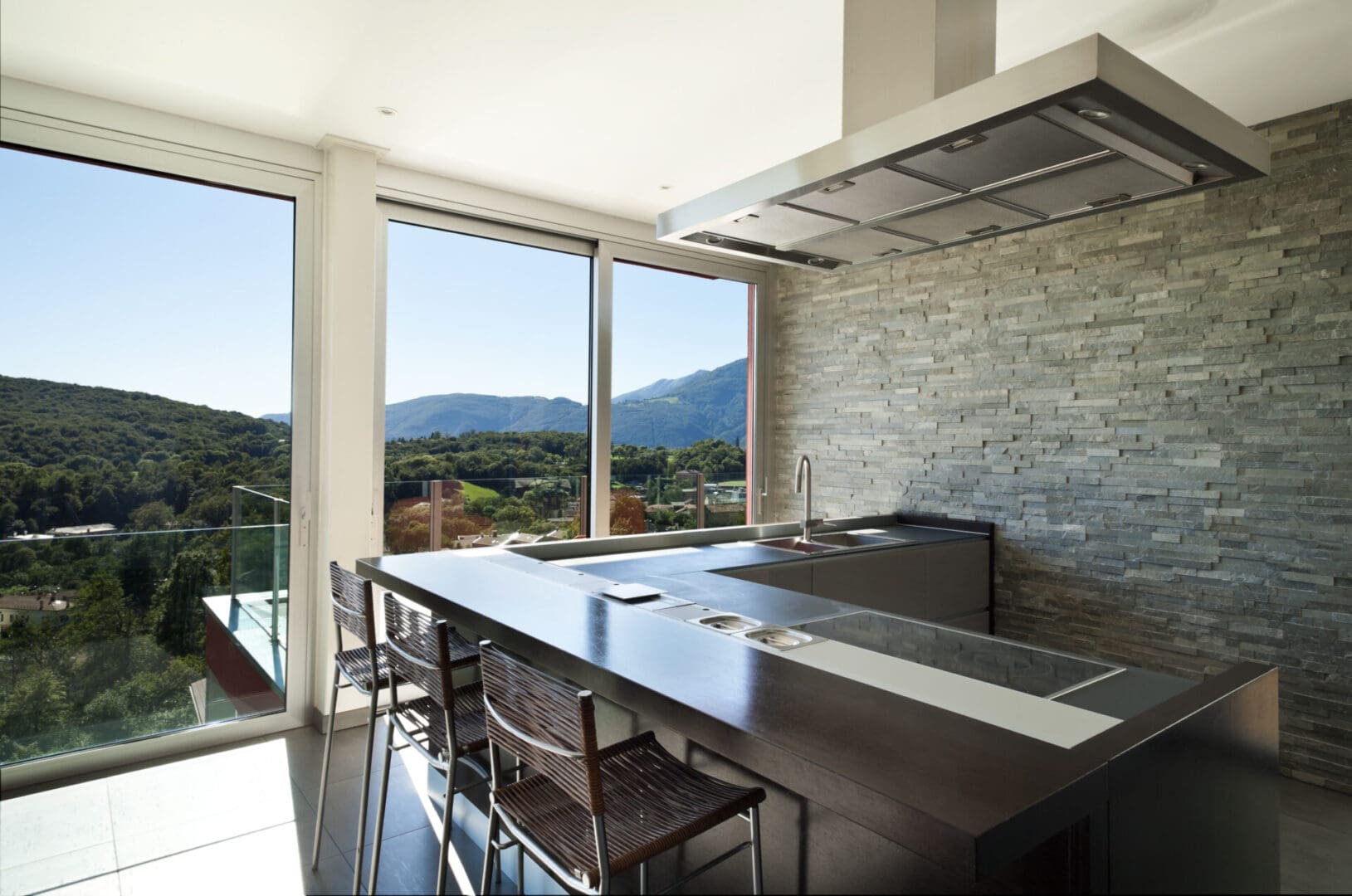 A kitchen with a large table and chairs