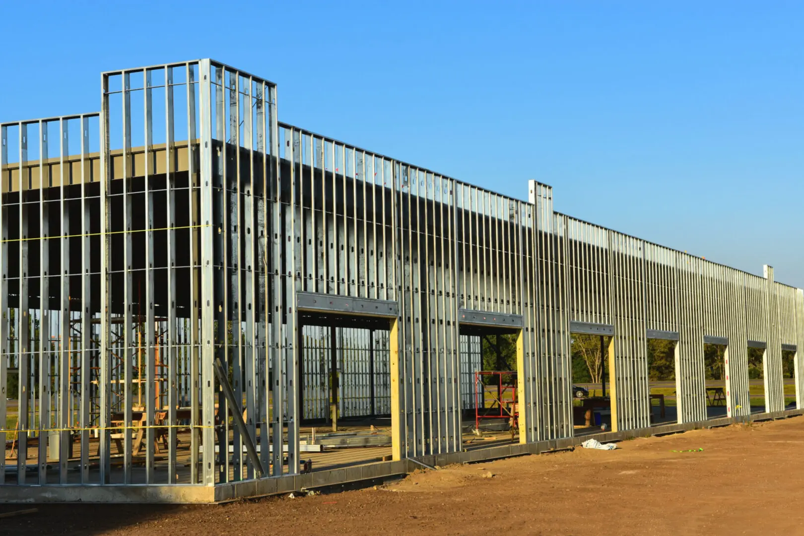 A building under construction with metal framing.