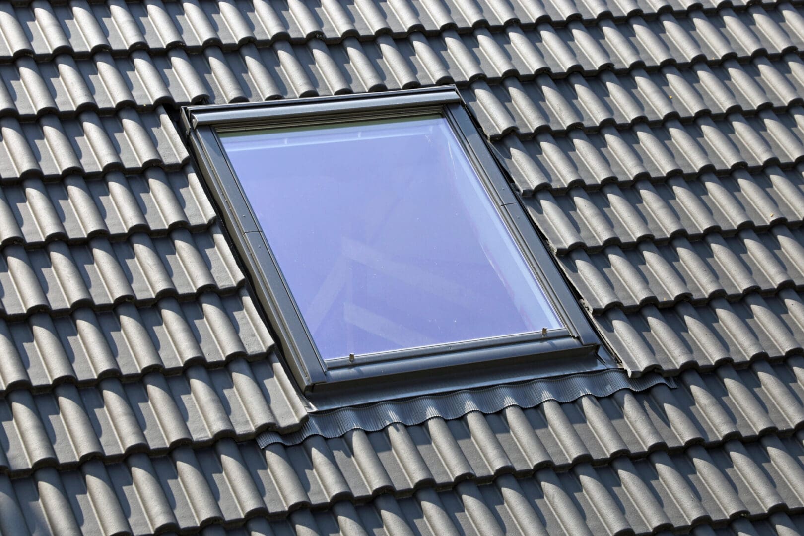A skylight on the roof of a house.