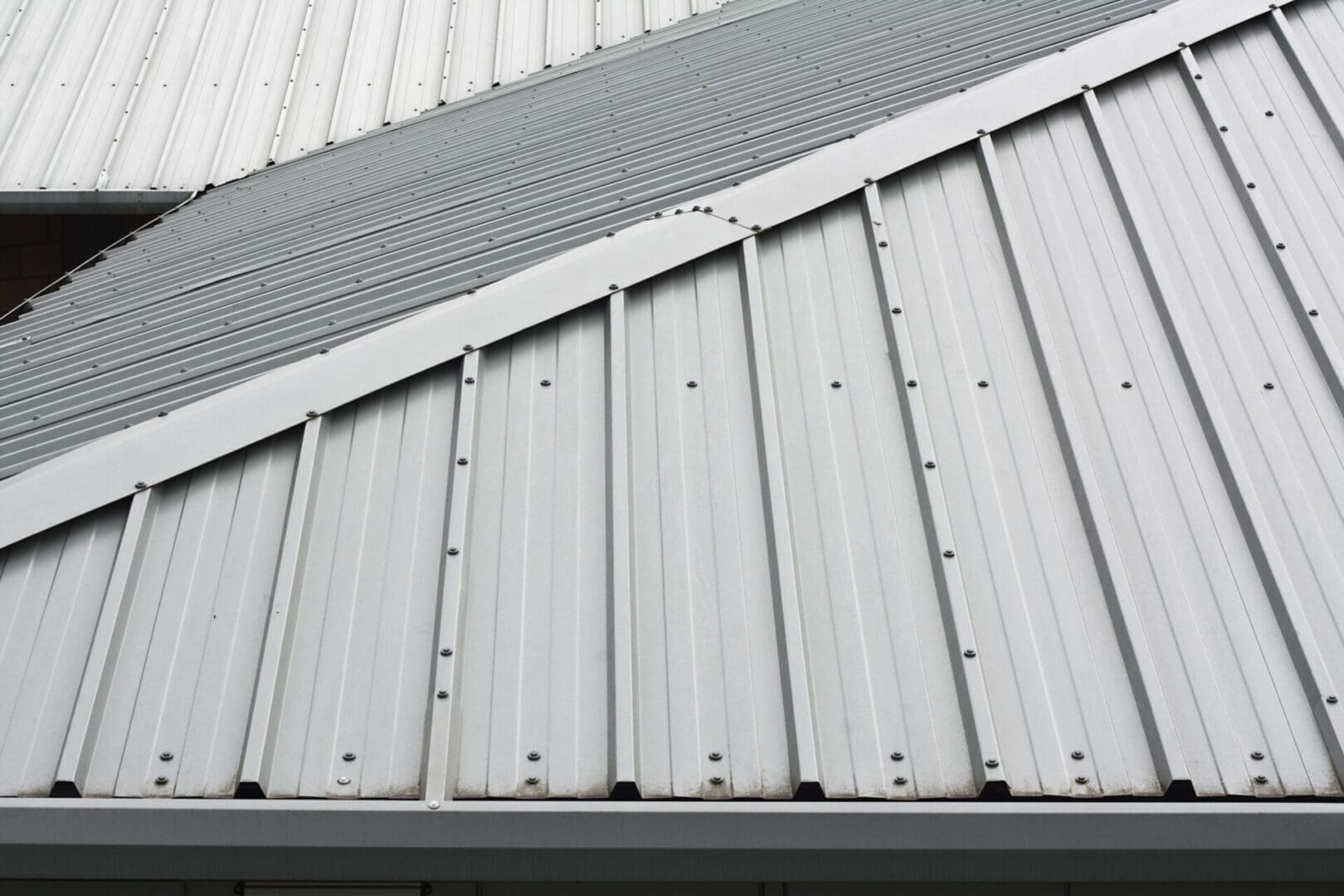 A close up of the side of a metal building