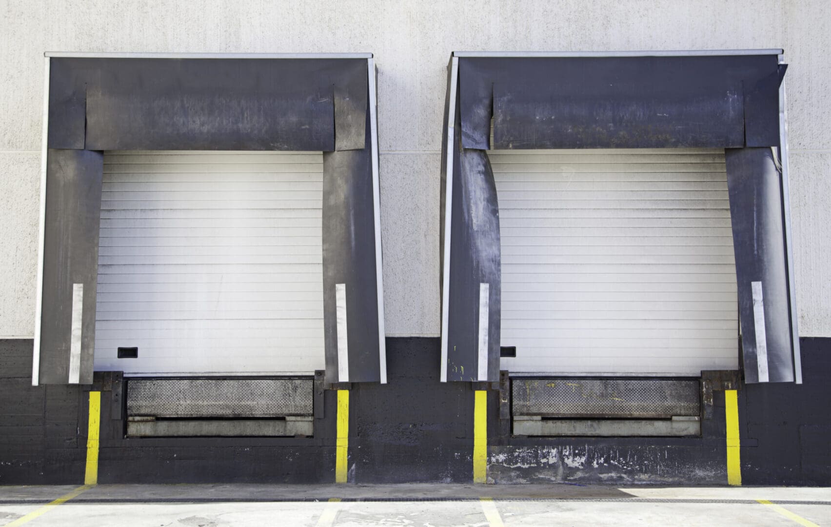 Two large doors that are open on a building.