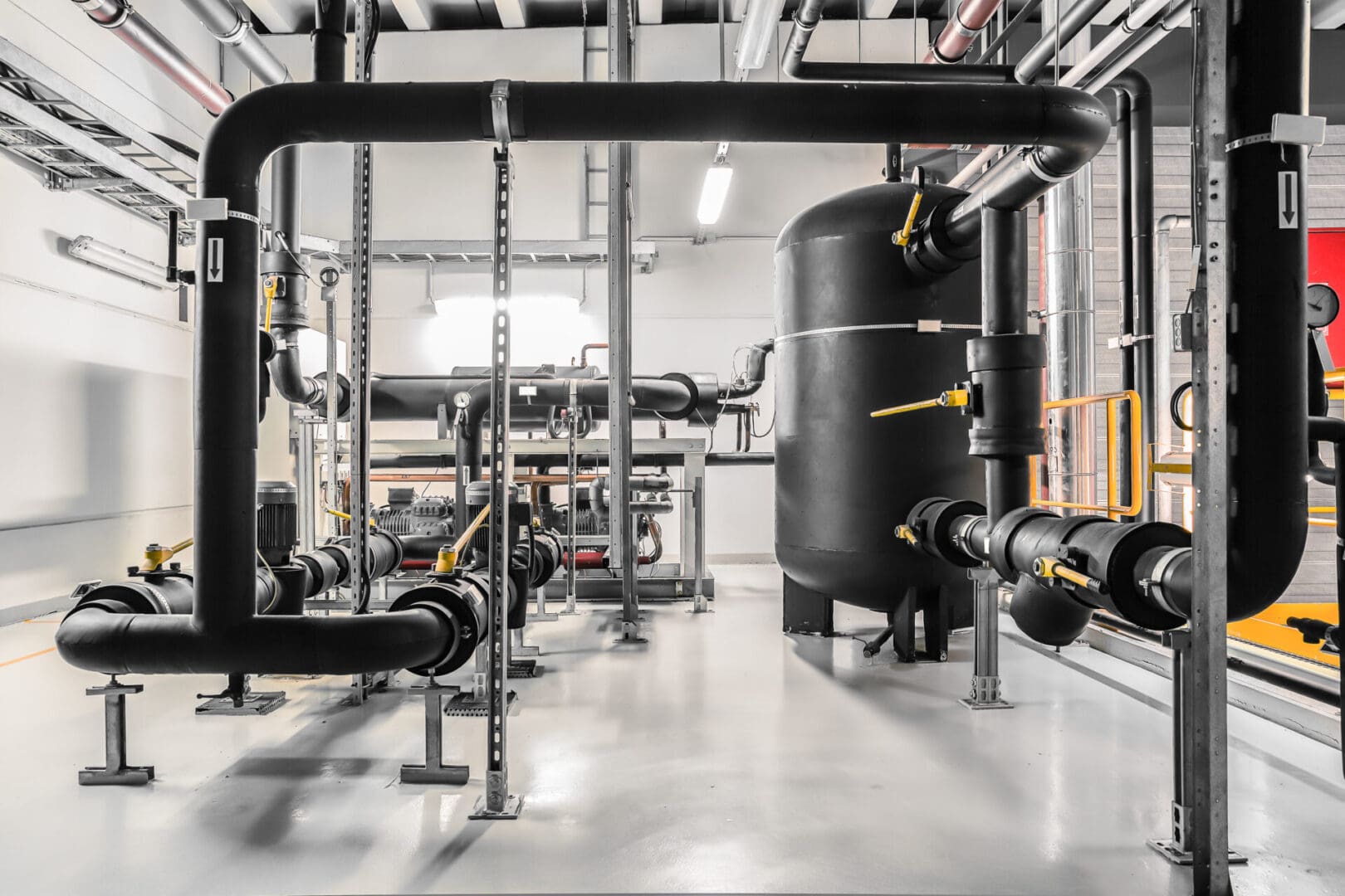 A large black tank sitting in the middle of a room.