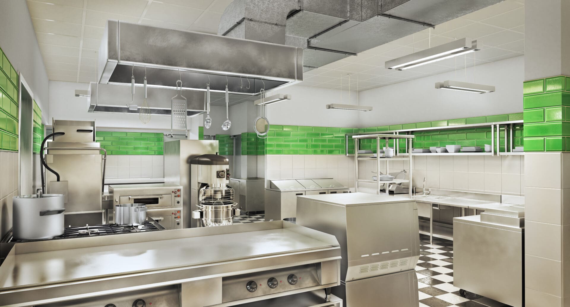 A kitchen with green walls and stainless steel appliances.