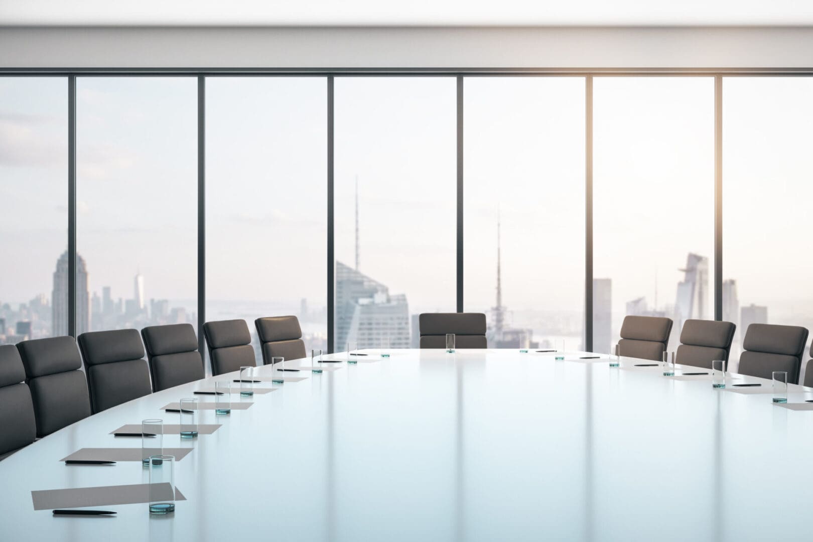 A large conference room with a view of the city.