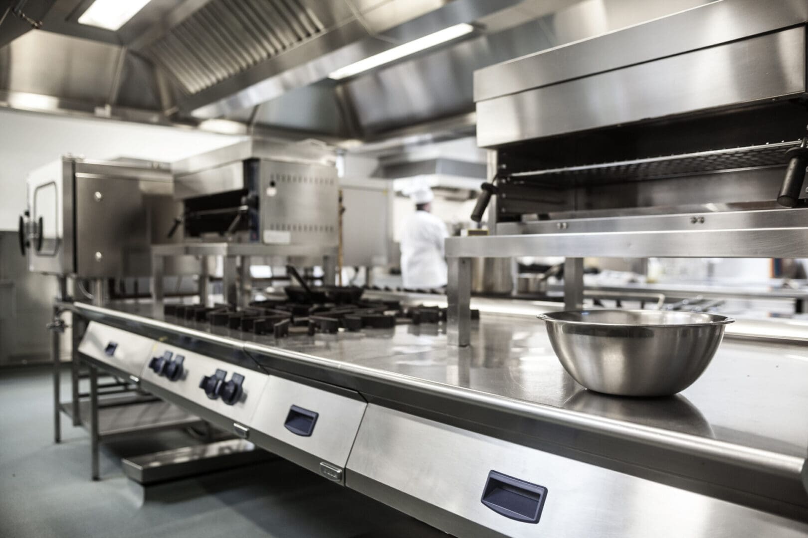 A kitchen with many different types of appliances.