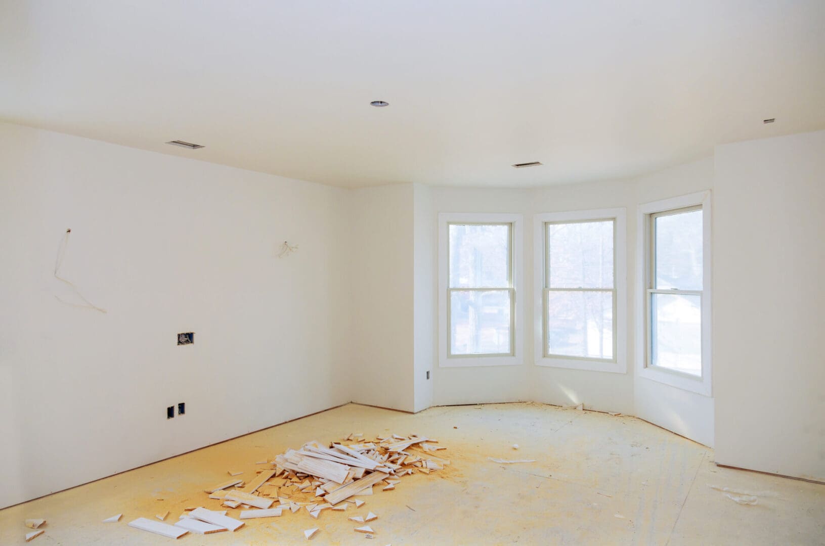 A room with a lot of white walls and floors