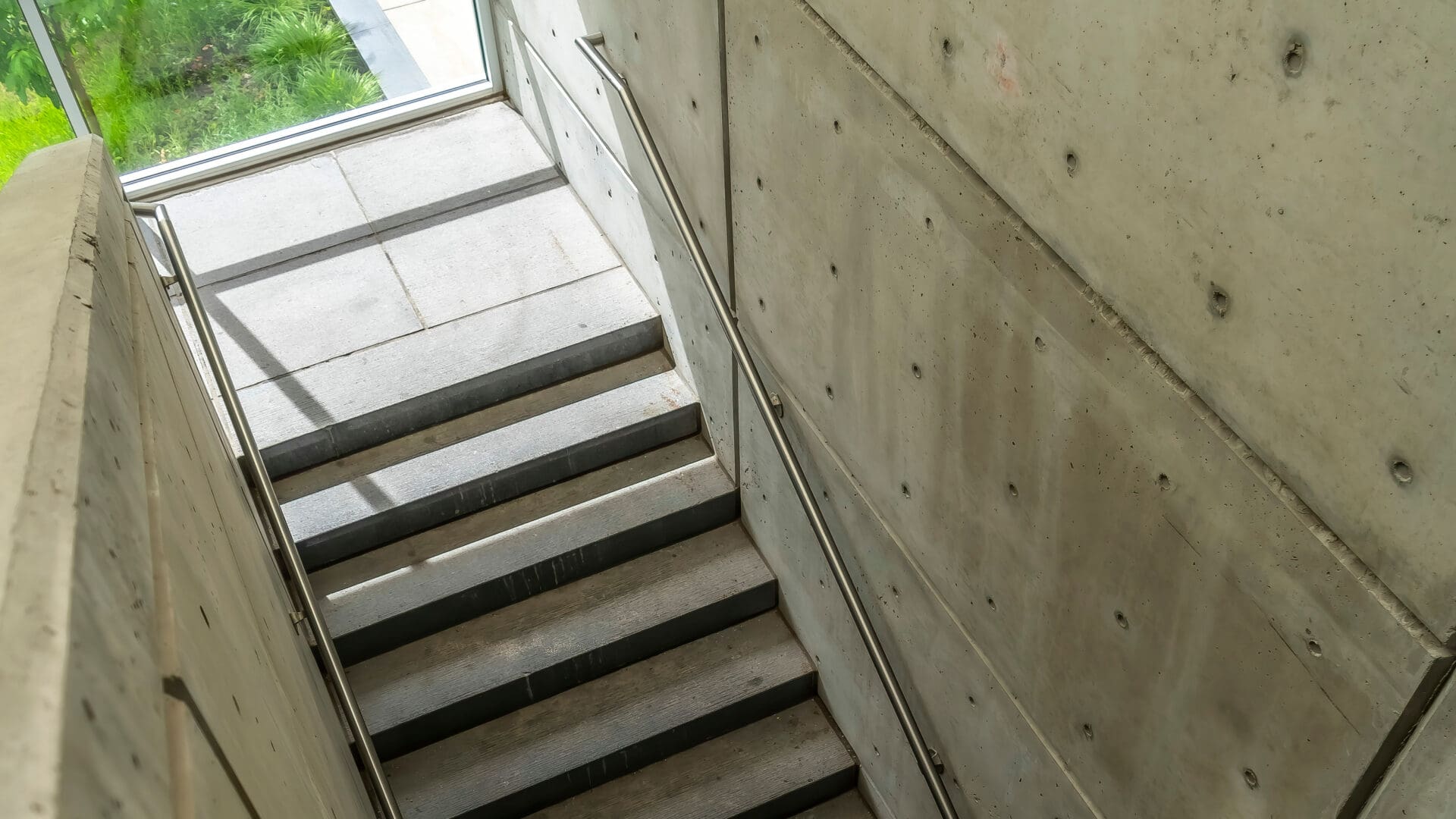 A view of some stairs in the middle of a building.