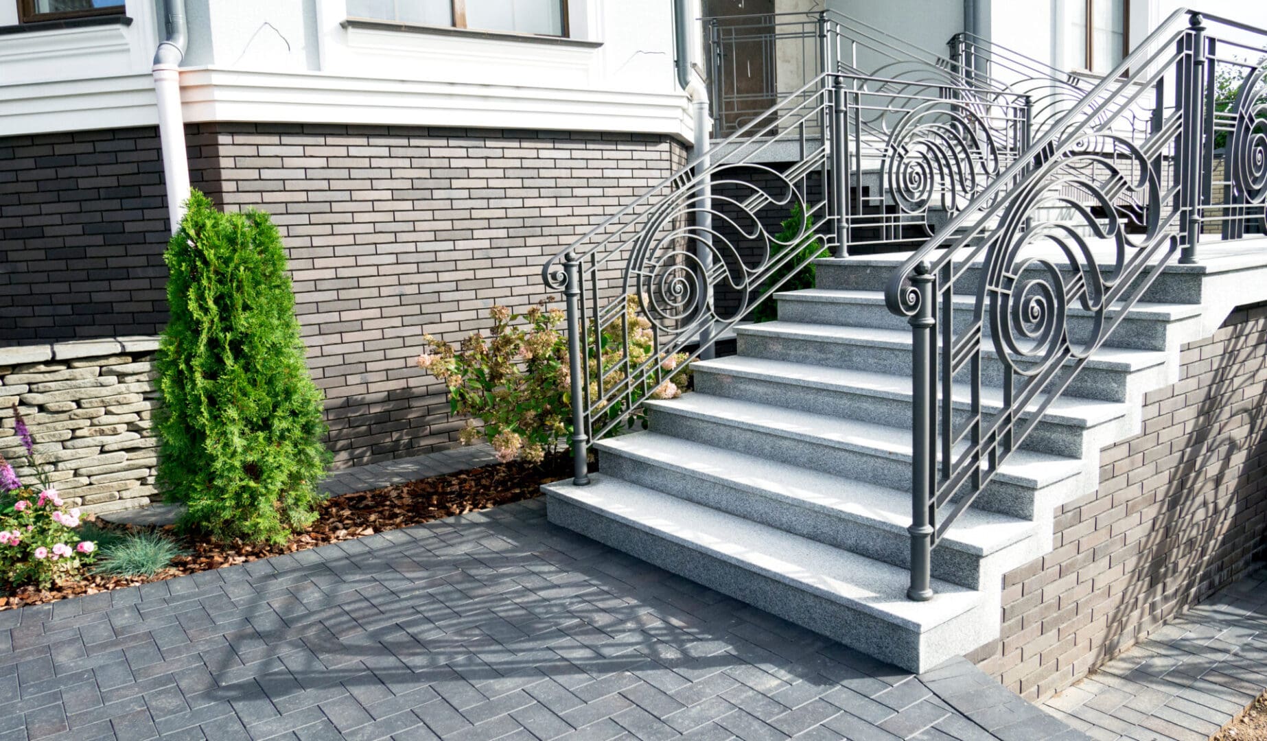 A set of stairs with metal railings on them.