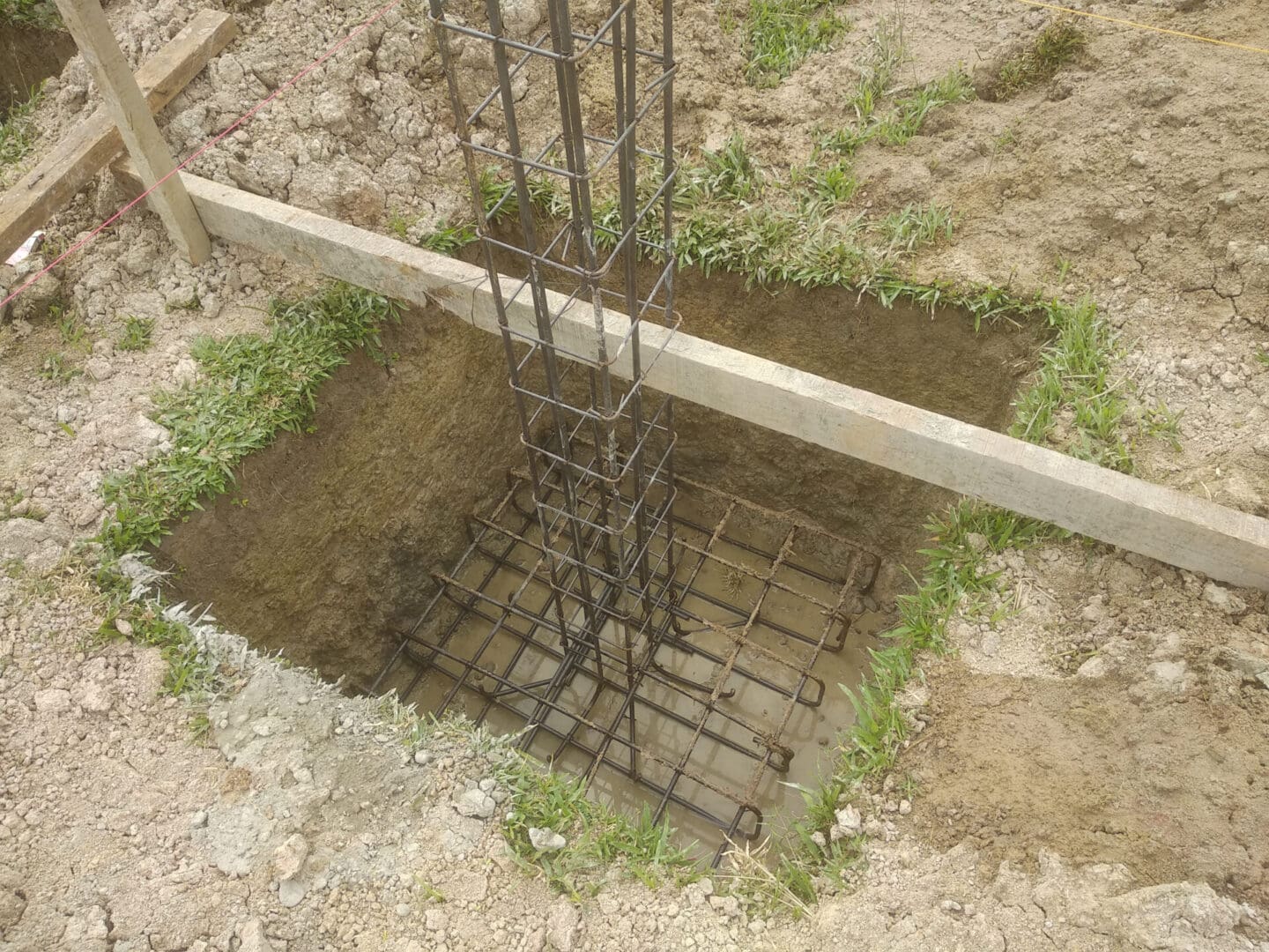 A concrete slab with metal bars in it.