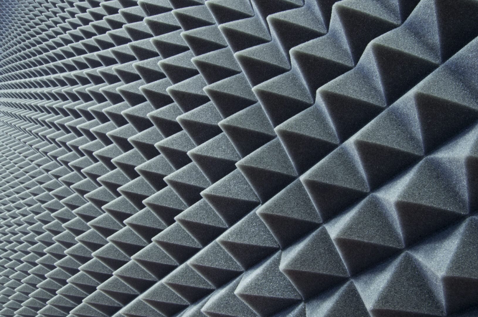 A close up of some gray acoustic panels