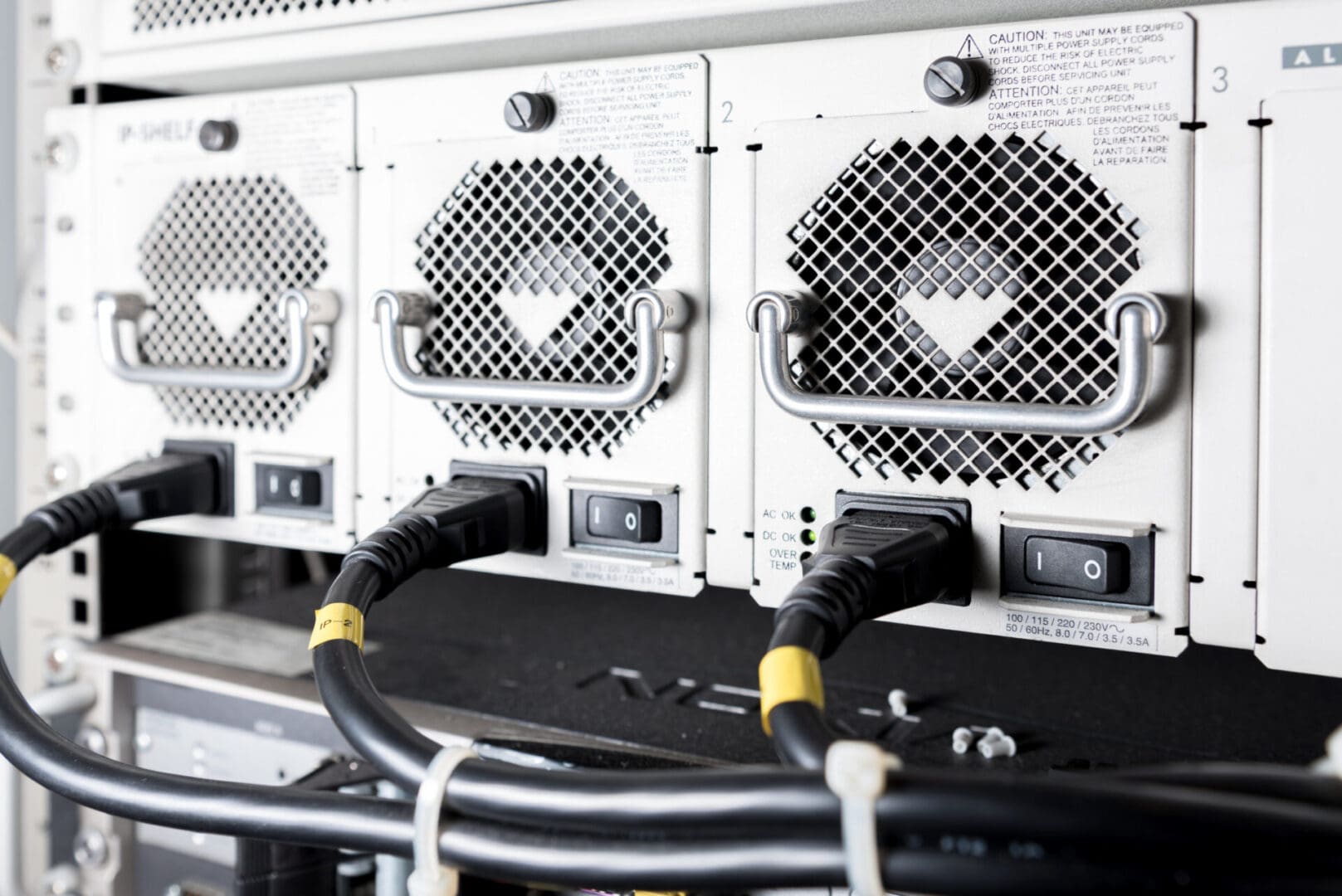 A close up of some wires on top of a rack