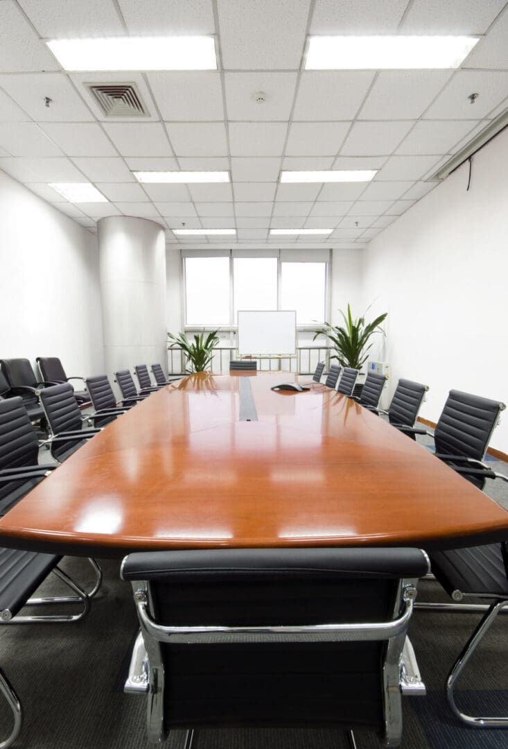 A large conference room with chairs and tables.