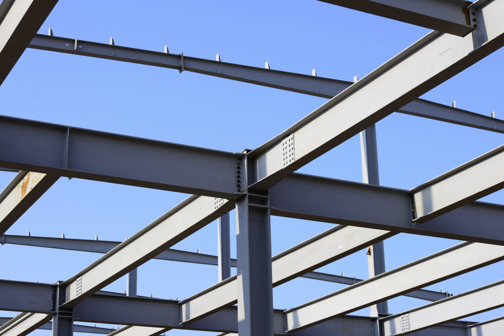 A steel structure with blue sky in the background.
