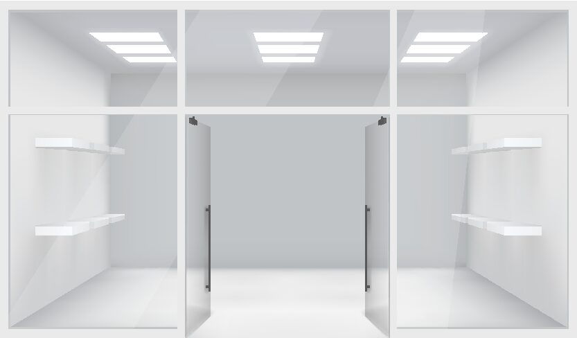 A white room with two open doors and shelves.