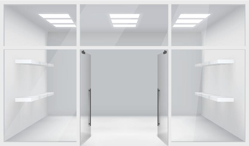 A white room with two open doors and shelves.