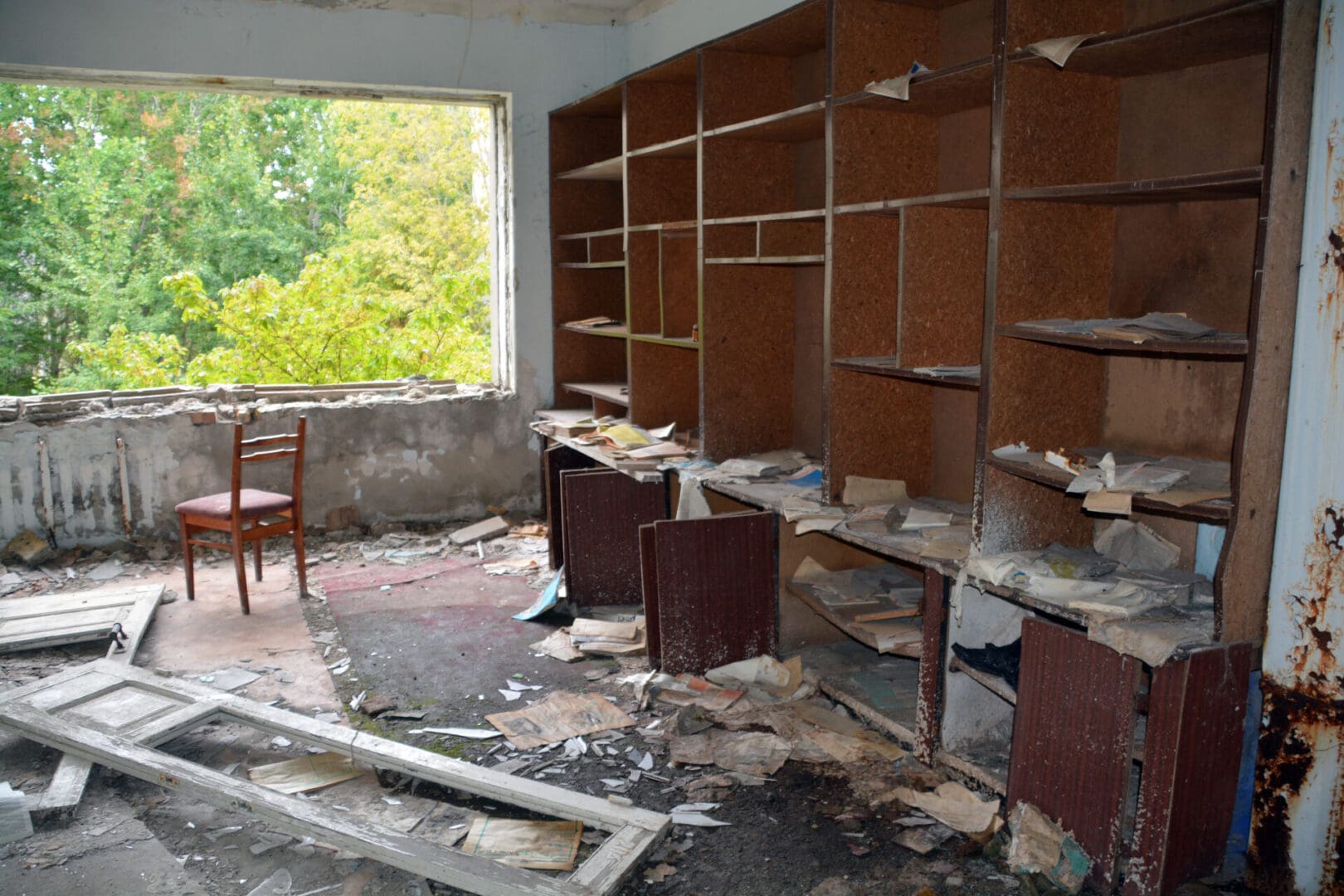 A room with many shelves and tables in it