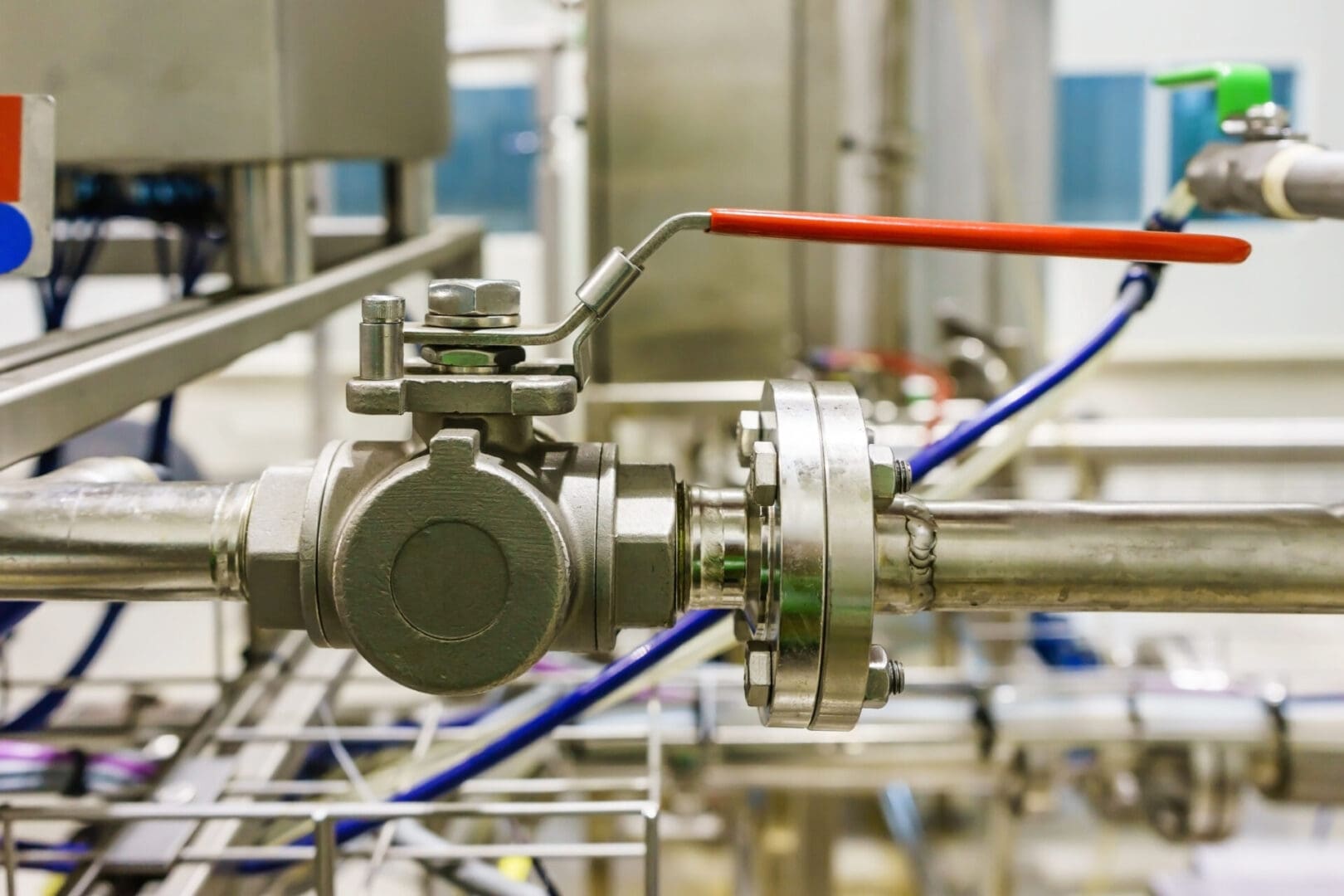 A close up of the pipes and valves in a factory